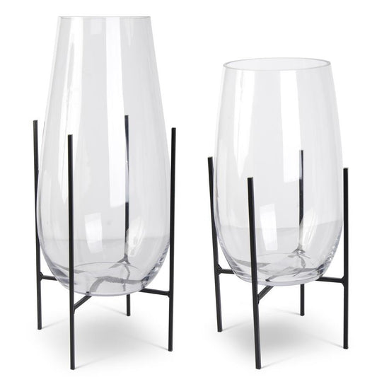CLEAR GLASS FLOATING VASES ON DARK METAL STANDS